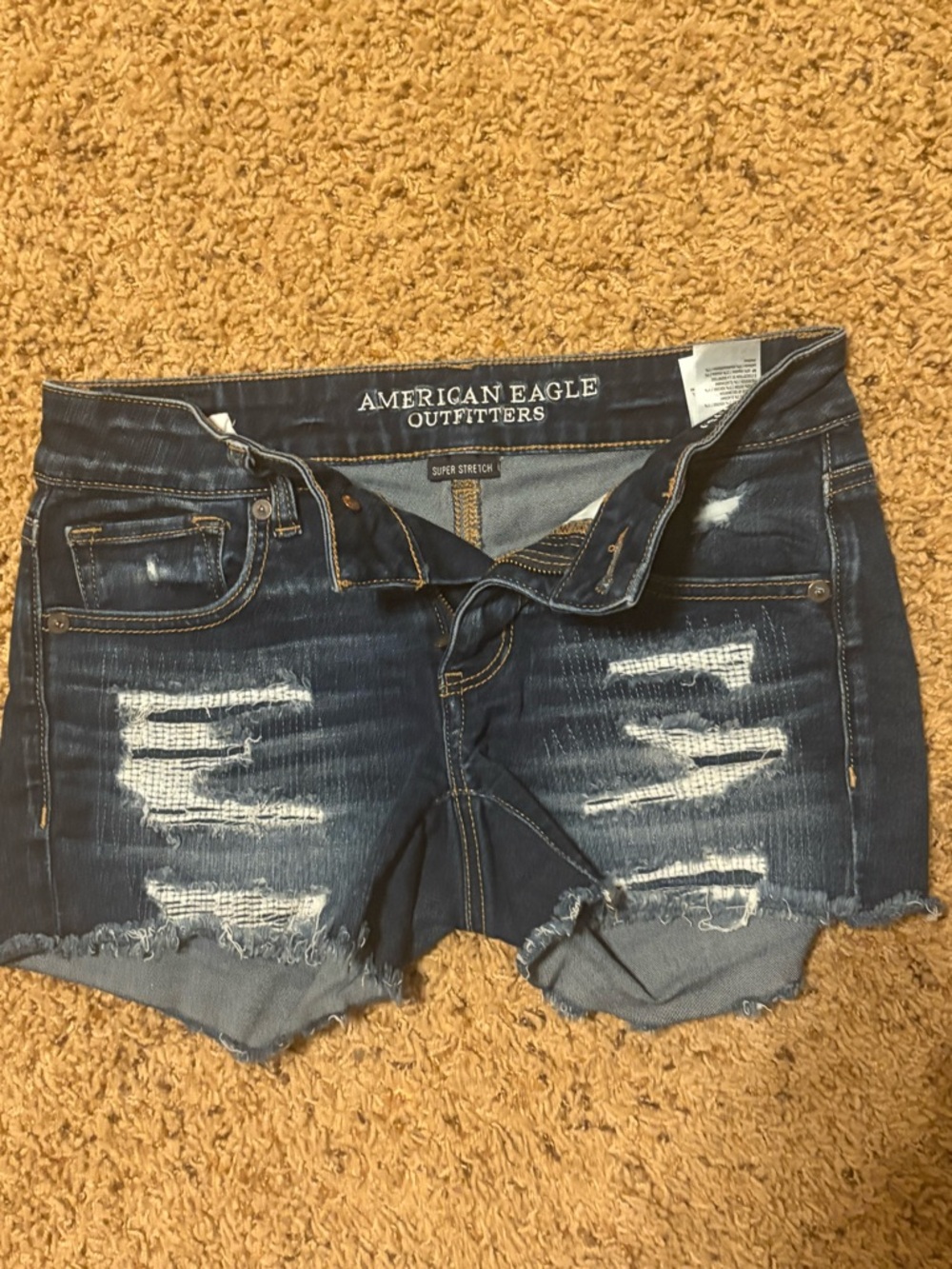 American Eagle Outfitters Distressed Dark Blue Frayed Hem Jean Shorts